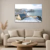 Tableau photo des Falaises d'Etretat sous la neige, au format 80 x 120 cm installé dans un salon moderne